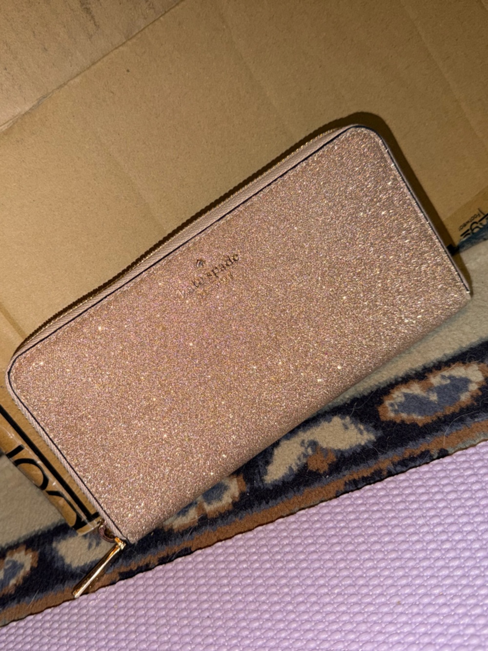 kate spade glitter zip-around wallet in rose gold shimmer